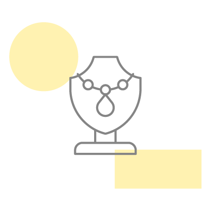 Jewelry display stand with rings and necklaces representing jewellery manufacturing and retail business operations